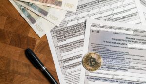 Odpłatne zbycie papierów wartościowych, akcji i pochodnych instrumentów finansowych. MF o PIT-38